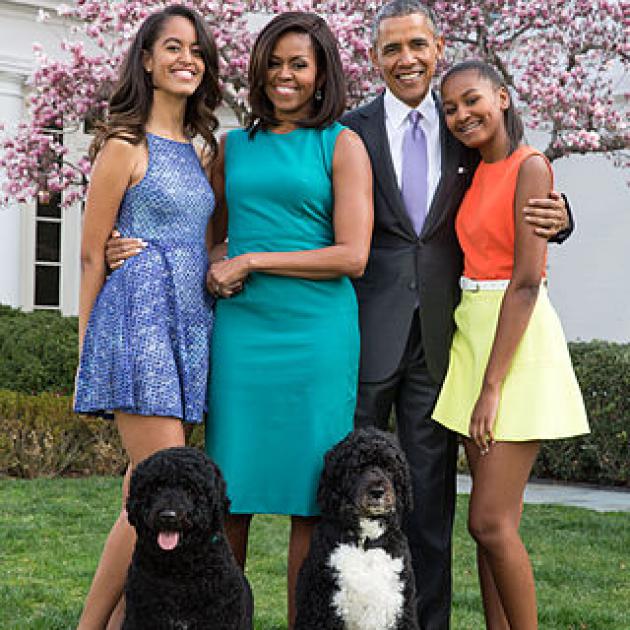 The Obama family posing outside