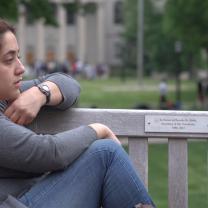 Photo from Hunting Ground - girl sitting alone and sad on porch
