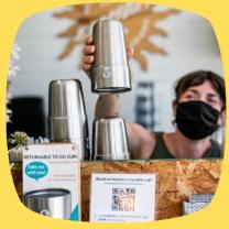 Man with cup at coffee shop